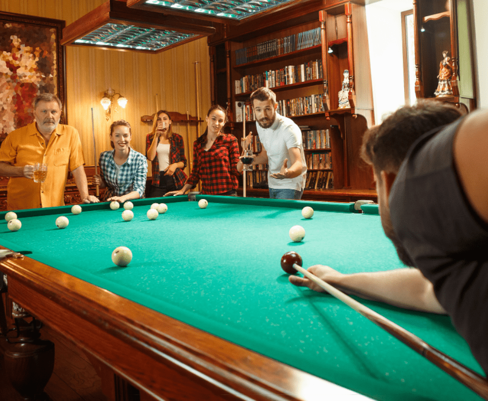 young-smiling-men-women-playing-billiards-office-home-after-work-business-colleagues-involving-recreational-activity (1)